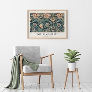 May include: A framed print of a vintage floral pattern with a blue background and red, white, and yellow flowers. The print is titled "William Morris" and "Honeysuckle I 1876".