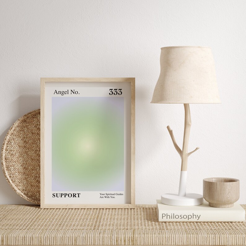 May include: A framed print with a light green and purple gradient background. The print features the text "Angel No. 333 SUPPORT" and "Your Spiritual Guides Are With You."