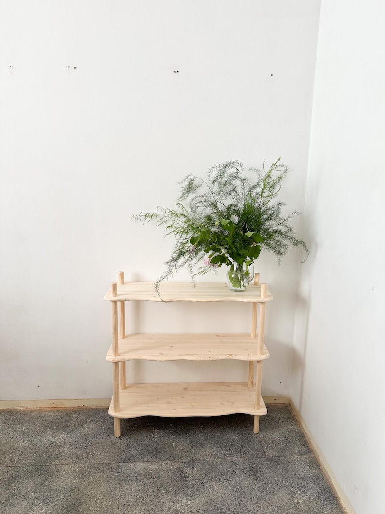 low wooden bookcase wavy