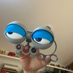 Ojos grandes controlados por la mano, versión 2 (archivos digitales)