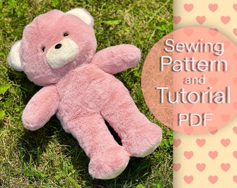May include: A pink plush teddy bear with white accents lying on green grass. The image includes the text "Sewing Pattern and Tutorial PDF".