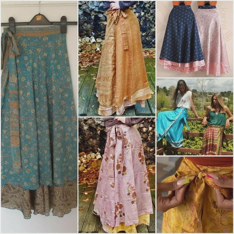 May include: A collection of wrap skirts featuring various floral and paisley patterns in colors including teal, gold, pink, and navy blue. These skirts are constructed with a wrap-around design that ties at the waist, showcasing layered fabric panels and diverse prints.