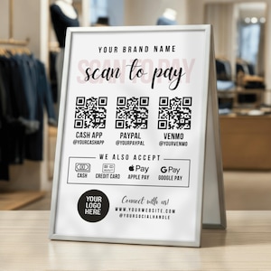 May include: A white A-frame sign with the text "YOUR BRAND NAME" and "scan to pay" in a script font. Below are QR codes for Cash App, PayPal, and Venmo. The sign also lists accepted payment methods: cash, credit card, Apple Pay, and Google Pay.
