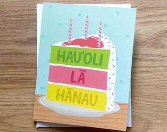 Tarjeta de felicitación de cumpleaños hawaiana, doblada, interior en blanco. Pastel Hau'oli La Hanau, color aguamarina.
