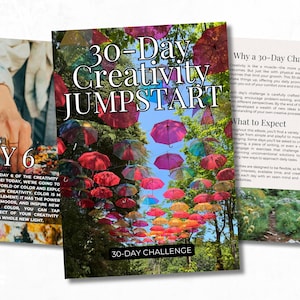 May include: A book cover titled "30-Day Creativity Jumpstart" with a vibrant image of colorful umbrellas suspended in the air. Additional pages detail the challenge and the benefits of the program. The cover also includes the text "Color Play Day 6".