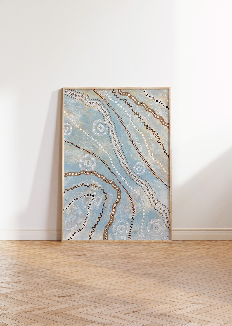 May include: A framed abstract painting with a blue background and brown and white patterns. The painting features a variety of shapes and lines, including circles, dots, and wavy lines.