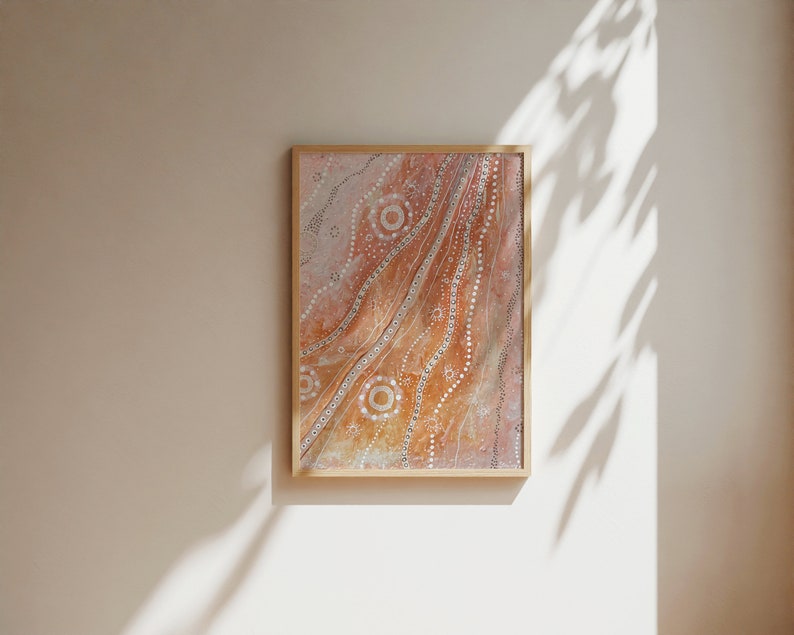 May include: A framed abstract painting with a brown and white pattern. The painting features a swirling design with white dots and circles on a brown background.