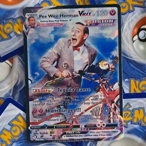 May include: A blue and red Pokemon trading card featuring Pee Wee Herman as a character. The card is titled "Pee Wee Herman VMAX" and has a blue background with a white border. The card has a picture of Pee Wee Herman riding a red bicycle with a tiger on the back. The card has a blue and red ability called "Tequila Dance" and a red attack called "Hamburger!!!".