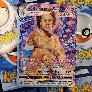 May include: A Pokemon trading card featuring Richard VMAX, a character with a blue and yellow outfit. The card has a purple and pink background with a holographic effect. The card's text reads "Sweatin' Sparkle Burst" and "Spandex Strike".