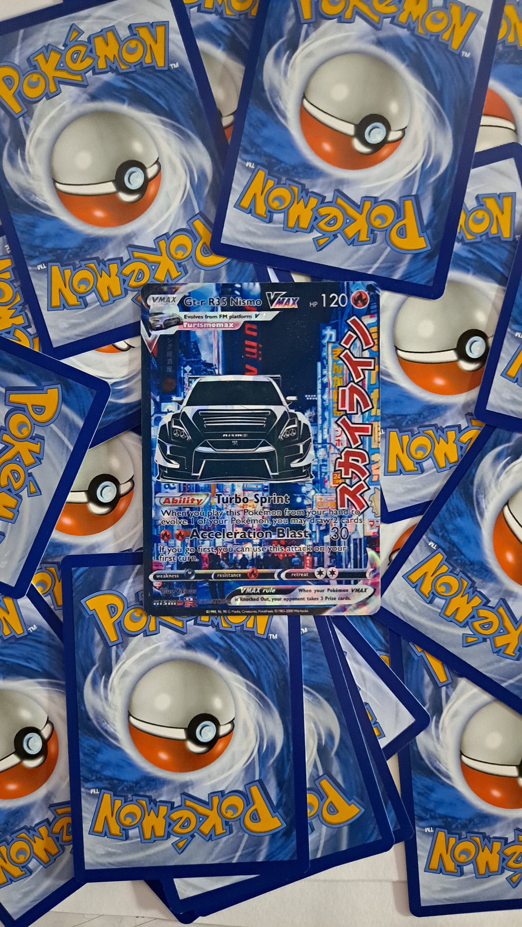Tarjeta pokemon nismo GTR R35