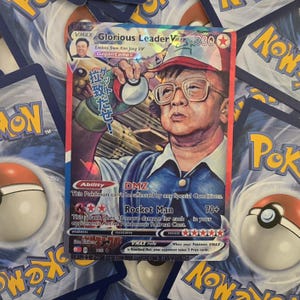 Carta Pokémon Kim Jong Ash