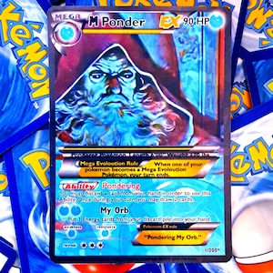 May include: A holographic trading card featuring a bearded figure in a hooded robe titled M Ponder EX with 90 HP. The card displays the text Ponderer Pokémon, Length 6'00", Weight 170 lbs, Ability Pondering, and the attack My Orb, Pondering My Orb.
