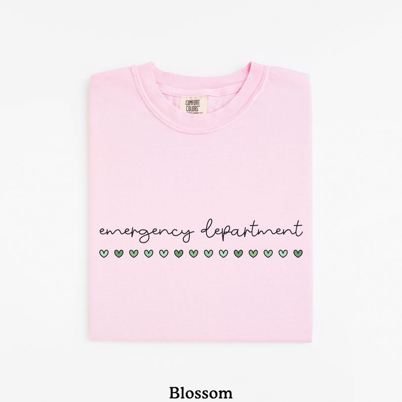 May include: Pink t-shirt with the text "emergency department" and a row of green hearts.