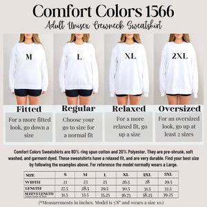 May include: Size chart for a unisex crewneck sweatshirt in sizes S, M, L, XL, 2XL, and 3XL. The chart shows the width, length, and sleeve length in inches. The model is 5'8" and wears a size 10. The sweatshirt is 80% ring spun cotton and 20% polyester. It is pre-shrunk, soft washed, and garment dyed.