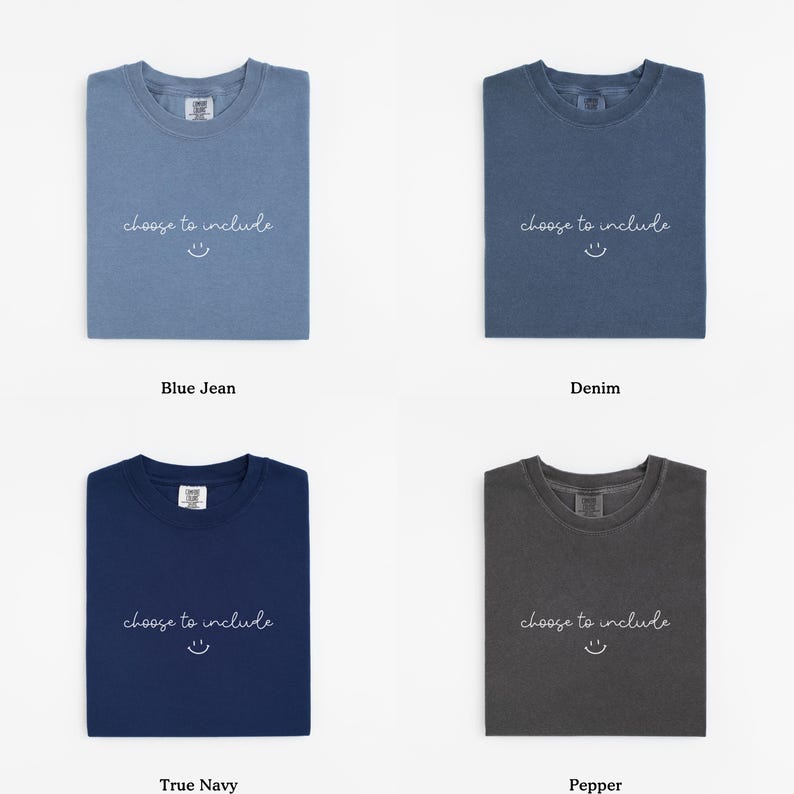May include: Four folded t-shirts in different colors: blue jean, denim, true navy, and pepper. Each shirt has the text "choose to include" and a smiling face printed on the front.