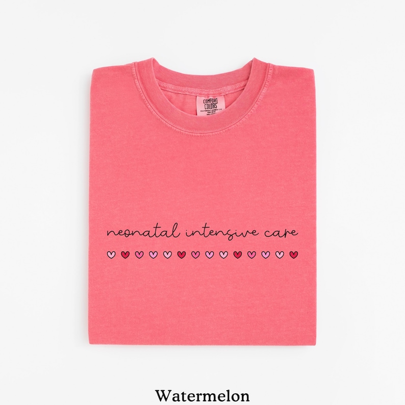 May include: Watermelon pink t-shirt with the text "neonatal intensive care" and a row of small pink and red hearts.