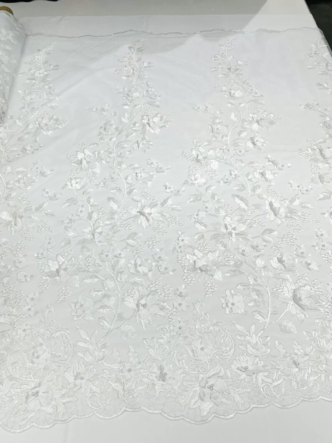 3D floral design embroider with pearls in a mesh lace-sold by the yard. White main image 1