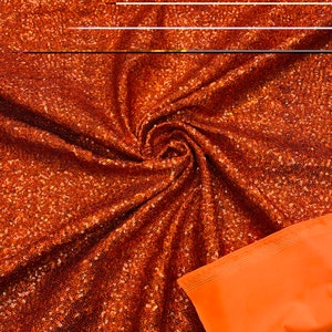 Burnt Orange Hologram Mini Glitz Sequins on a 4 Way Stretch Spandex Fabric- Sold by The Yard