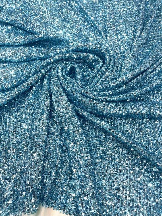 Light Blue Chain shiny clear sequins design on a 4 way stretch mesh fabric -Sold by the yard.