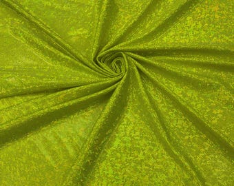 Holograma de aluminio amarillo neón efecto cristal roto / 147 cm de ancho / Tricot de nailon y spandex elástico en 4 direcciones. Se vende cortado a medida.