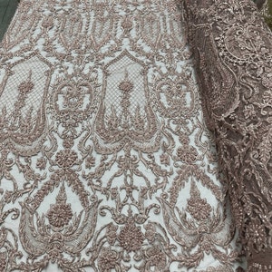 Diva Design Embroidery with Heavy Beaded On a Mesh Lace-Sold By The Yard. Mauve