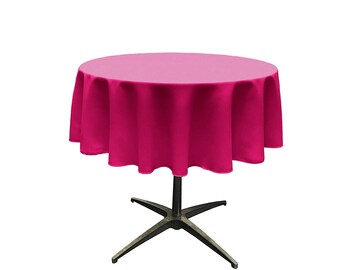 Mantel de popelina de poliéster redondo, color fucsia, sin costuras.