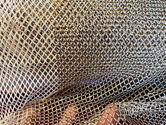 Rhinestones on Soft Stretch Fish Net Fabric 45 Wide sold by the Yard.  Champagne 