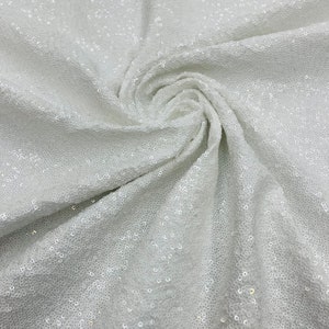White Mini Glitz Sequins on a 4 Way Stretch Spandex Fabric- Sold by The Yard