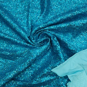 Turquoise Hologram Mini Glitz Sequins on a 4 Way Stretch Spandex Fabric- Sold by The Yard