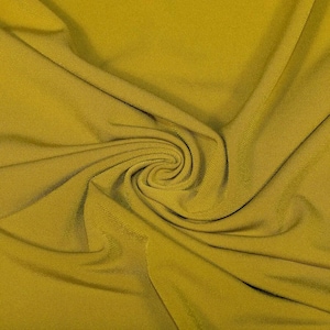 ITY Fabric Polyester Knit Jersey 2 Way Stretch Spandex Sold By The Yard. Mustard
