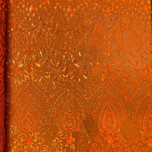 Orange Iridescent  Diamond Geometric Sequin On A Stretch Mesh Fabric. By The Yard