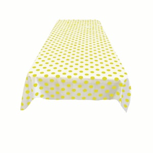 Nappe rectangulaire en poly coton à pois jaunes sur blanc. (Choisissez la taille ci-dessous)