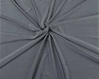 Tela brillante de nailon y elastano Milliskin, elástica en 4 direcciones, 147 cm de ancho. Se vende cortada a medida, color gris oscuro.