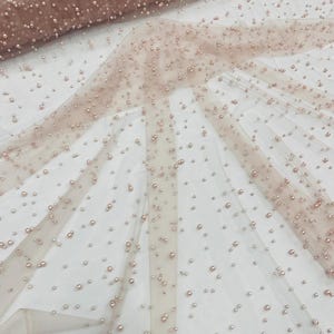 Beige Heavy Scattered Pearls Studded Mesh, 2-Way Stretch, Sold By The Yard.