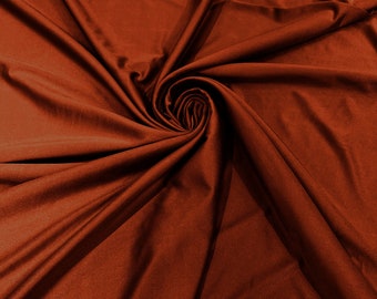 Tejido de nailon y elastano Milliskin color óxido brillante, elástico en 4 direcciones, 58" de ancho. Se vende cortado a medida.