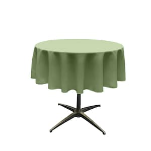 May include: A round green tablecloth draped over a table with a four-legged base.