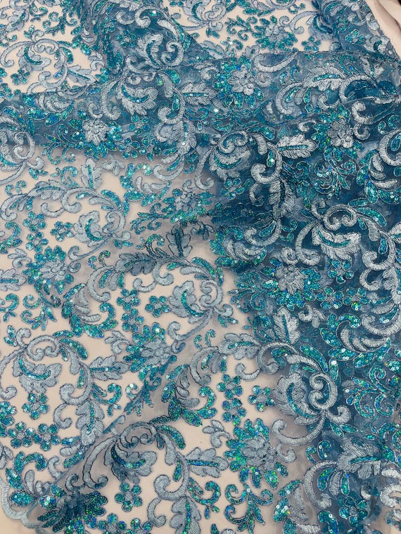 Light Blue Metallic Corded Flowers Embroider With Sequins On a Mesh Lace Fabric- Sold By The Yard.