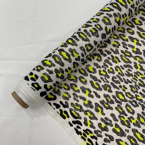 Neon Green/Black Foil Leopard Print on a White Stretch Nylon Spandex Tricot/Milliskin -Sold by the yard.