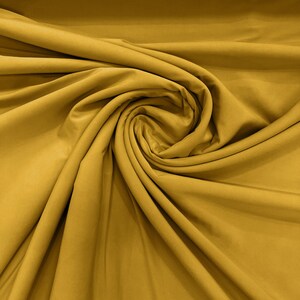Mustard ITY Fabric Polyester Knit Jersey 2 Way Stretch Spandex Sold By The Yard