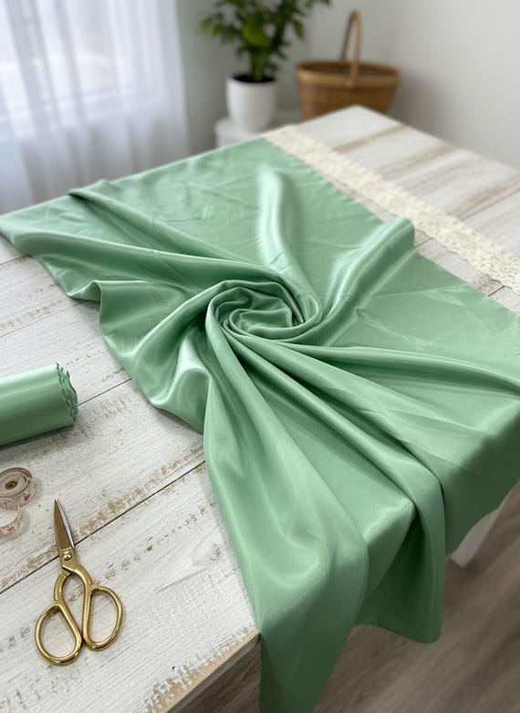 Mint Green Glossy Liquid Bridal Satin Fabric, 58” Wide for Prom and Wedding Dresses.