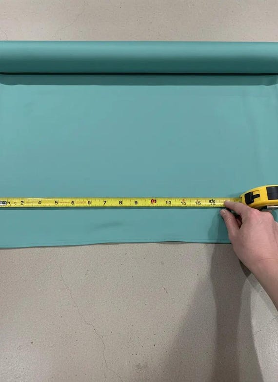 Sea Foam Satin Matte Stretch Lamour Fabric, 58" Wide for Apparel.