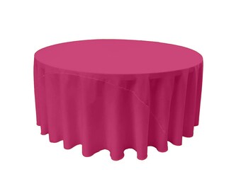 Mantel de popelina de poliéster redondo liso color fucsia sin costuras.