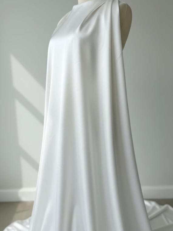 Ivory Glossy Liquid Bridal Satin Fabric, 58” Wide for Prom and Wedding Dresses.
