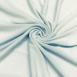 ITY Fabric Polyester Knit Jersey 2 Way Stretch Spandex Sold By The Yard. Powder Blue