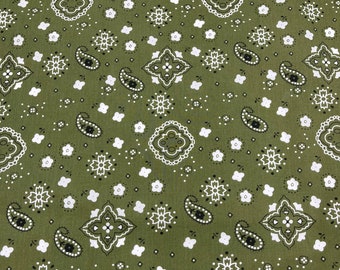 Könnte beinhalten: Grüner Stoff mit einem weißen und schwarzen Paisley-Muster.