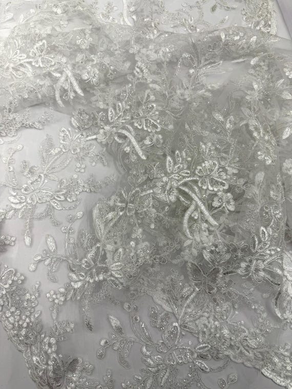 Ivory Corded Lace with Butterfly Embroidery and Sequin on Mesh Fabric.-Sold by the yard