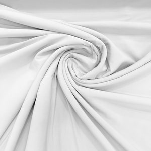 White ITY Fabric Polyester Knit Jersey 2 Way Stretch Spandex Sold By The Yard