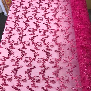 FUCHSIA FLORAL DESIGN EMBROIDERY WITH IRIDESCENT SEQUIN ON A MESH-SOLD BY YARD main image 1