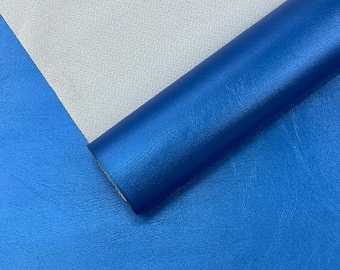 Tela de vinilo marino azul metalizado. Se vende cortada a medida. Tela de vinilo. Tapicería de cuero sintético. 54" de ancho.