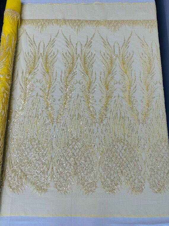 Yellow Feathers damask embroider and heavy beaded on a mesh lace fabric- Sold by the yard